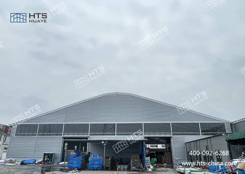 这是一家专一于大跨度抗台风仓储篷房出产的专业工厂 这是一家专一于大跨度抗台风仓储篷房出产的专业工厂